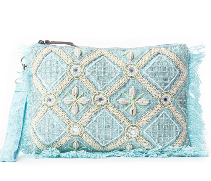 Turquoise boho pouch with embroidered diamond pattern, fringe edges, silver bead accents, and shell embellishments.

