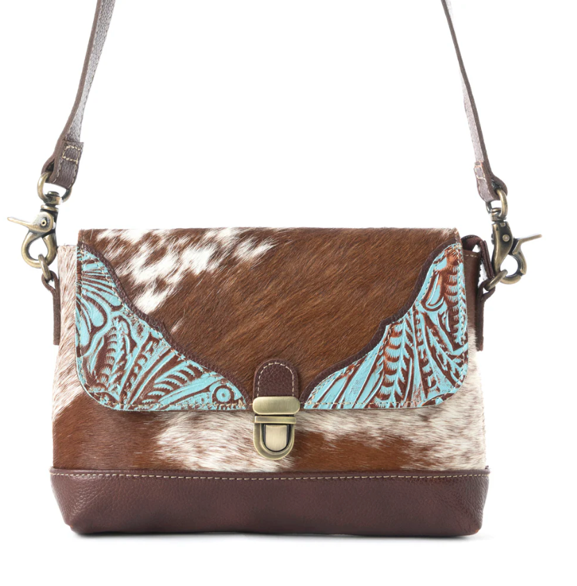 "Ridge Morning Glory Leather & Hairon Bag with turquoise embossed details, brown and white hairon hide, crossbody strap, and brass hardware – Western chic handbag"