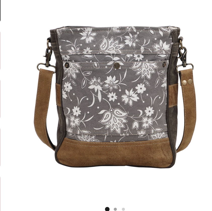 "Blossom Print Shoulder Bag in gray canvas with white floral design, leather accents, and adjustable strap – handcrafted everyday handbag"
