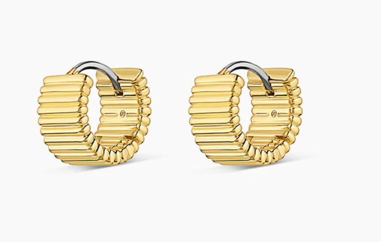 Close-up of striking gold hoop earrings featuring a unique textured design with a modern twist. Ideal for making a bold fashion statement, these earrings provide a secure closure for comfortable wear.Let me know if you need any more assistance or additional information!