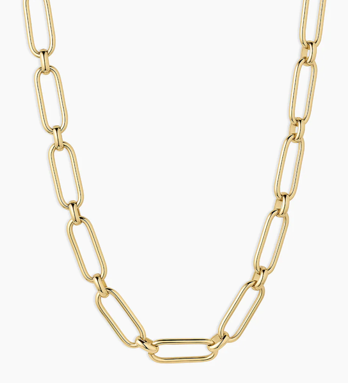 Gold link necklace with elongated links, designed for layering or standalone wear, featuring a modern and minimalist style.