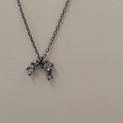 Horn Shaped Necklace W/ Muti Sized CZ