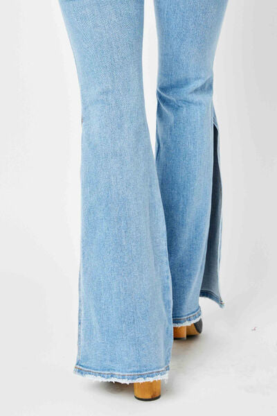 Judy Blue Full Size Mid Rise Raw Hem Slit Flare Jeans - Premium Jeans from Trendsi - Just $91.85! Shop now at Three Blessed Gems