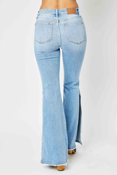 Judy Blue Full Size Mid Rise Raw Hem Slit Flare Jeans - Premium Jeans from Trendsi - Just $91.85! Shop now at Three Blessed Gems